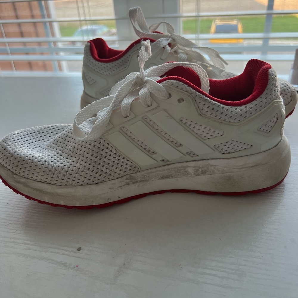 White and red adidas shoes